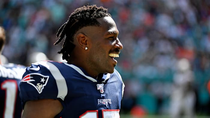 NFL receiver Antonio Brown smiles in a Patriot uniform